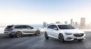 Sleek Opel Insignia In Motion Wallpaper