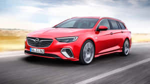 Sleek Opel Insignia In Vibrant Setting Wallpaper