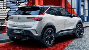 Sleek Opel Mokka On A Scenic Road Wallpaper