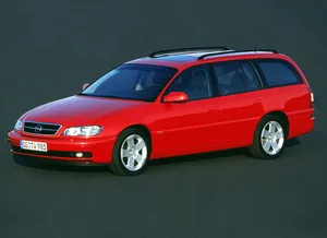 Sleek Opel Omega In Downtown Street Wallpaper