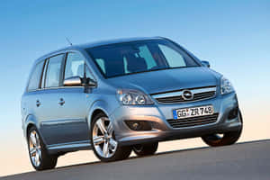 Sleek Opel Zafira In Urban Setting Wallpaper