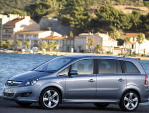 Sleek Opel Zafira On The Road Wallpaper
