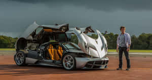 Sleek Pagani Huayra Luxury Sports Car In Action Wallpaper