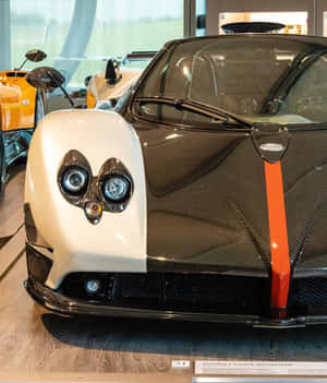 Sleek Pagani Zonda C12 Roadster In Stunning Outdoor Setting Wallpaper