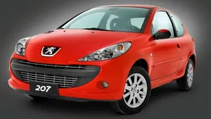 Sleek Peugeot 207 In Natural Landscape Wallpaper