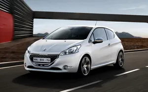 Sleek Peugeot 208 In Motion Wallpaper