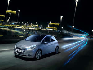 Sleek Peugeot 208 In Motion Wallpaper
