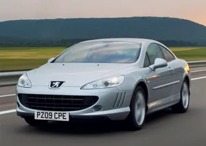 Sleek Peugeot 407 In Action Wallpaper