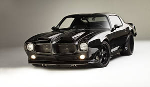 Sleek Pontiac Firebird - A Symbol Of Power In Black Wallpaper