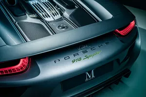 Sleek Porsche 918 Spyder Showcased On Track Wallpaper