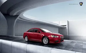 Sleek Proton Vehicle In Motion Wallpaper