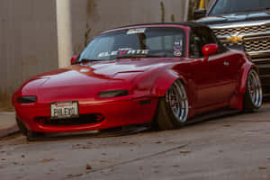 Sleek Red 1995 Mazda Mx 5 Miata Wallpaper