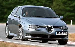 Sleek Red Alfa Romeo 156 In Motion Wallpaper