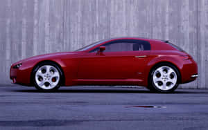 Sleek Red Alfa Romeo Brera In Action Wallpaper