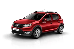 Sleek Red Dacia In Action Wallpaper