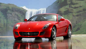 Sleek Red Ferrari 599 Gtb Fiorano On The Road Wallpaper