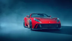 Sleek Red Ferrari 812 Superfast In Action Wallpaper