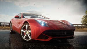 Sleek Red Ferrari F12 Berlinetta In Action Wallpaper