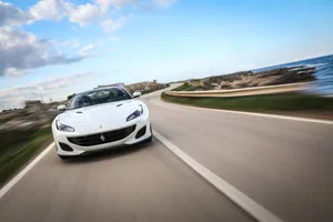 Sleek Red Ferrari Portofino In Action Wallpaper