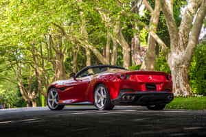 Sleek Red Ferrari Portofino On The Open Road Wallpaper