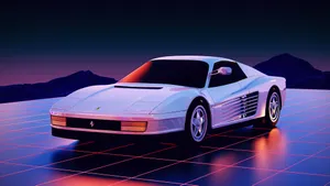 Sleek Red Ferrari Testarossa On A Picturesque Mountain Road Wallpaper