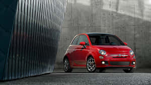 Sleek, Red Fiat 500l On The Open Road Wallpaper