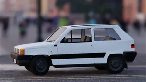 Sleek Red Fiat Panda On City Street Wallpaper