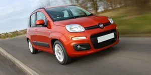 Sleek Red Fiat Panda On The Road Wallpaper