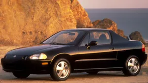 Sleek Red Honda Civic Del Sol On Open Road Wallpaper