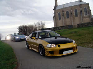 Sleek Red Honda Civic Del Sol Parked Outdoors Wallpaper