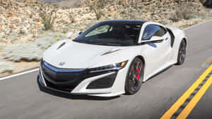 Sleek Red Honda Nsx On The Road Wallpaper