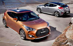 Sleek Red Hyundai Veloster In The City Wallpaper