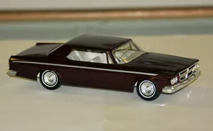 Sleek Red Sports Car In A Studio Setting Wallpaper