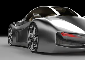 Sleek Red Sports Car In Action Wallpaper