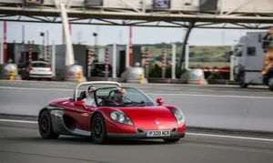 Sleek Renault Sport Spider On A Race Track Wallpaper