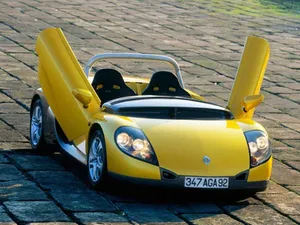 Sleek Renault Sport Spider On The Road Wallpaper