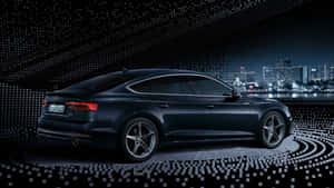 Sleek Silver Audi A5 Speeding On An Open Road Wallpaper