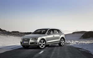 Sleek Silver Audi Q5 On The Open Road Wallpaper