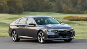 Sleek Silver Honda Accord In Motion Wallpaper