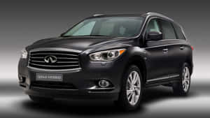 Sleek Silver Infiniti Qx60 On The Road Wallpaper