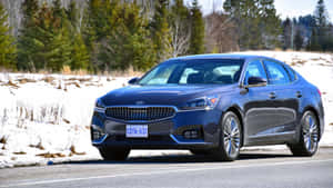 Sleek Silver Kia Cadenza On The Open Road Wallpaper