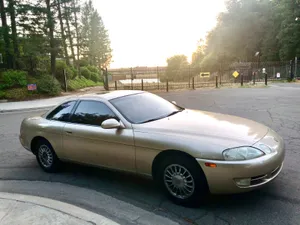 Sleek Silver Lexus Sc 300 In All Its Glory Wallpaper