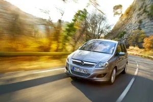 Sleek Silver Opel Zafira On The Road Wallpaper