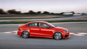 Sleek Silver Sedan Cruising On The Open Road Wallpaper