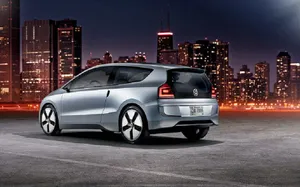 Sleek Silver Volkswagen Up City Car Wallpaper