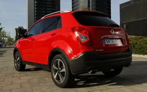 Sleek Ssangyong Suv On The Road Wallpaper