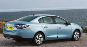 Sleek & Stylish Renault Fluence On The Road Wallpaper