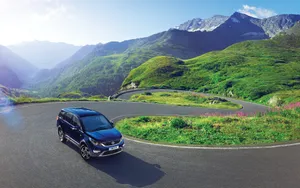 Sleek Tata Motors Vehicle On The Road Wallpaper