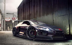 Sleek Tuned Car In Action Wallpaper