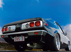 Sleek Vintage Mazda Rx-3 In Action Wallpaper